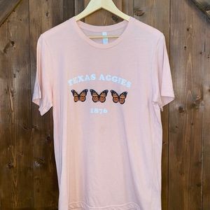 TAMU butterfly peach T-shirt. Size large.